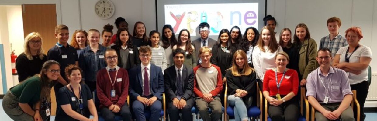 Group of people smiling.