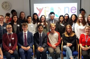 Group of people smiling.