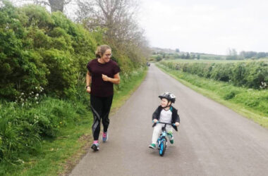 Emma Peters running with Grandson.