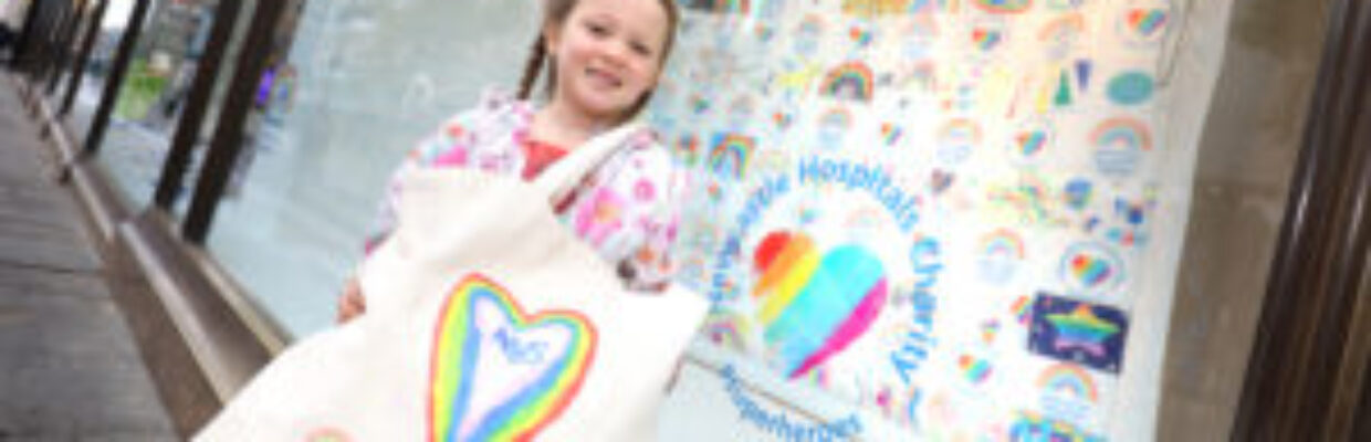 Girl holding Newcastle Charity bag.